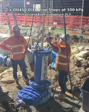 Two DN450 line stop fittings installed on a live water main on Bribie Island Road, Caboolture